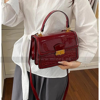 Scarlet crown handbag