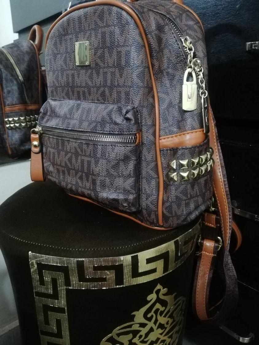 https://mines.pk/product/maxim-mini-leather-backpack/