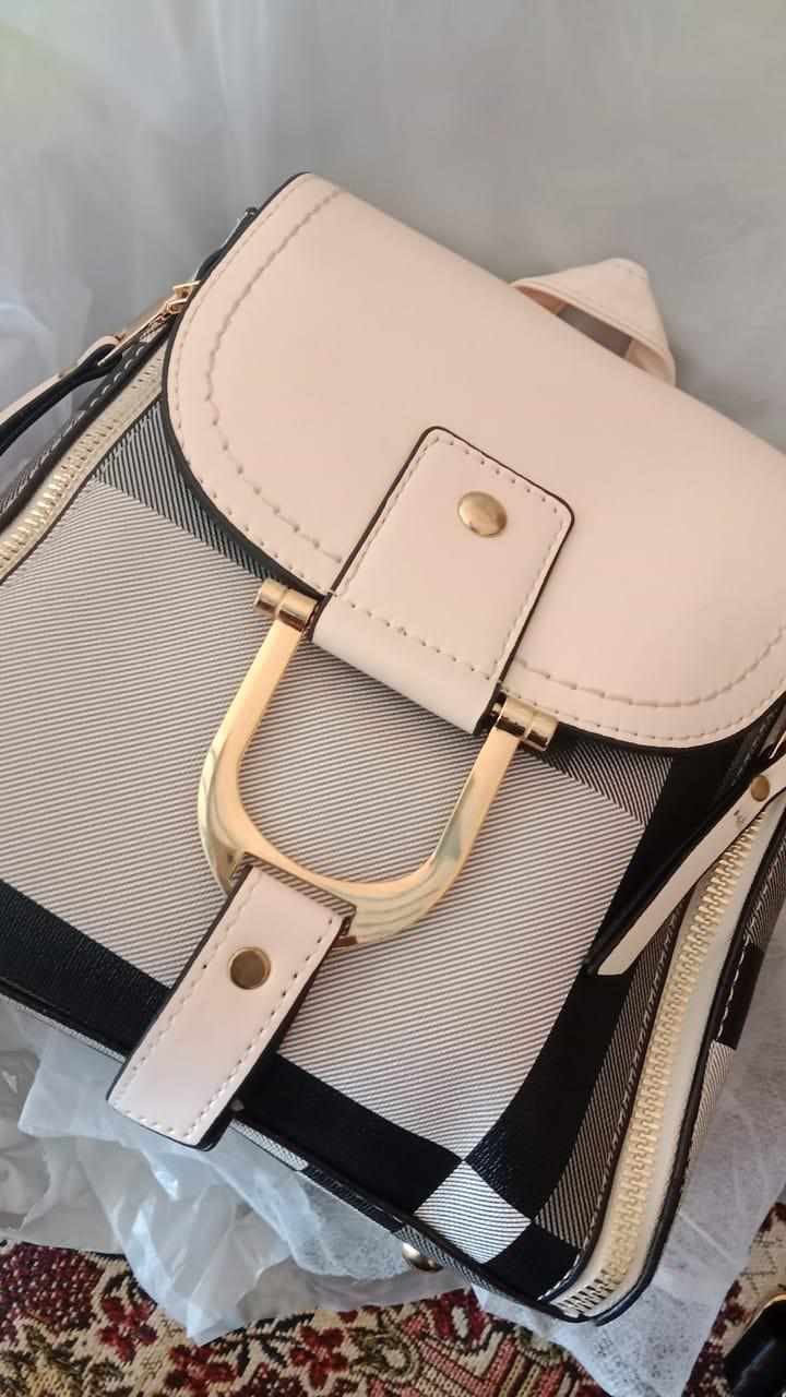 https://mines.pk/product/duet-backpack-handbag/